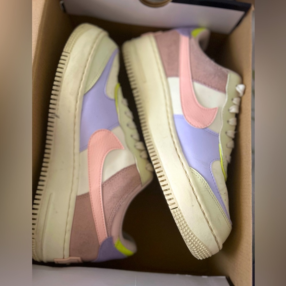 Nike Air Force 1 trainers in pastel pink, lavender, and …